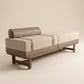 Supellex Home bench Lusso tapizado en tela color beige con rodillo de apoyo en cuero marrón y estructura en madera nogal - vista en perspectiva tres cuartos
