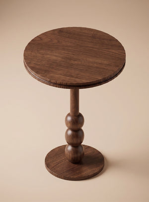 Supellex Home mesa auxiliar redonda Aitana en madera maciza de nogal con superficie circular y pilar escultural de esferas torneadas - vista en perspectiva