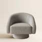 Supellex Home poltrona Taru tapizada en tela texturizada color gris claro con base redonda tapizada - vista frontal